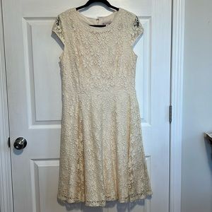 Cream colored dress with lace overlay